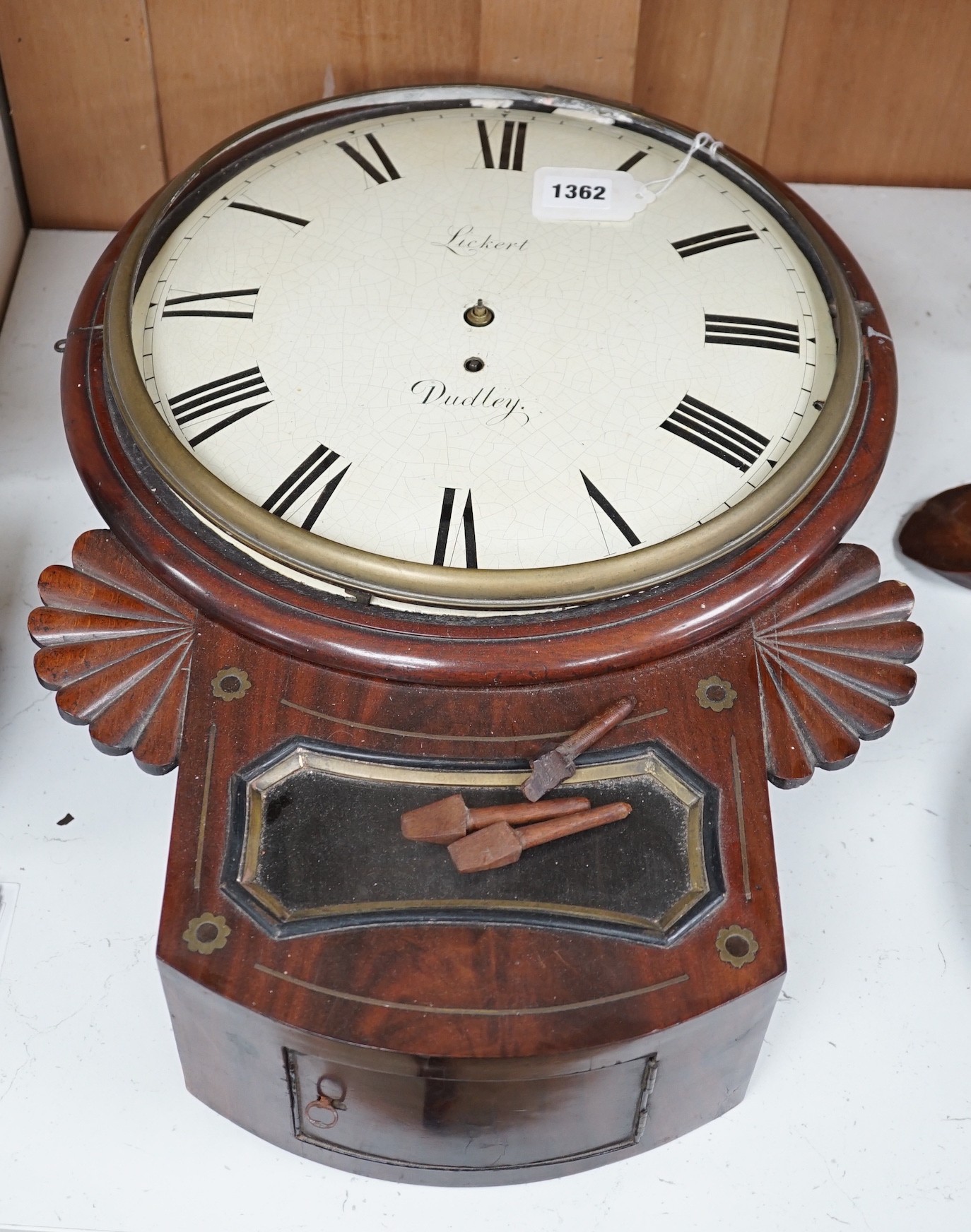 An early 19th century mahogany drop-dial wall clock, single fusee movement, signed Lickert, Dudley (P), length 52cm